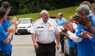 Hendersonville Fire Dept. Chief Scotty Bush honored at ADT-sponsored reunion in July 2015.