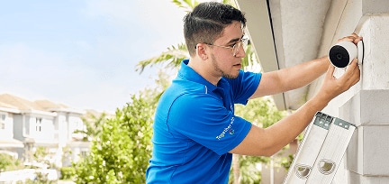 Someone using the ADT+ App Someone using the ADT+ App