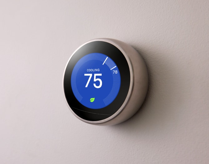 Google Nest Learning Thermostat on a wall 