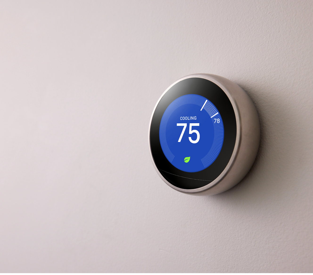 Google Nest Learning Thermostat on a wall