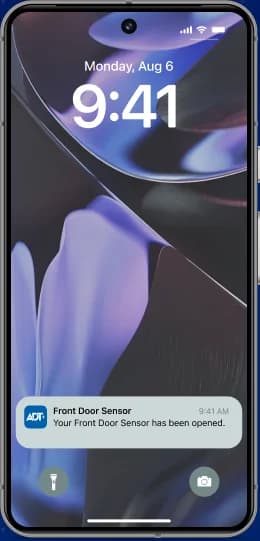 ADT+ app showing a front door sensor notification alert