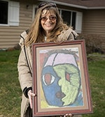 Kathy Grainger with her son's rescued painting.