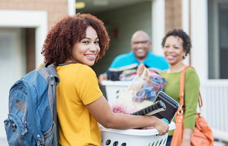 College Safety Tips: Moving To College Parents and their child at their college