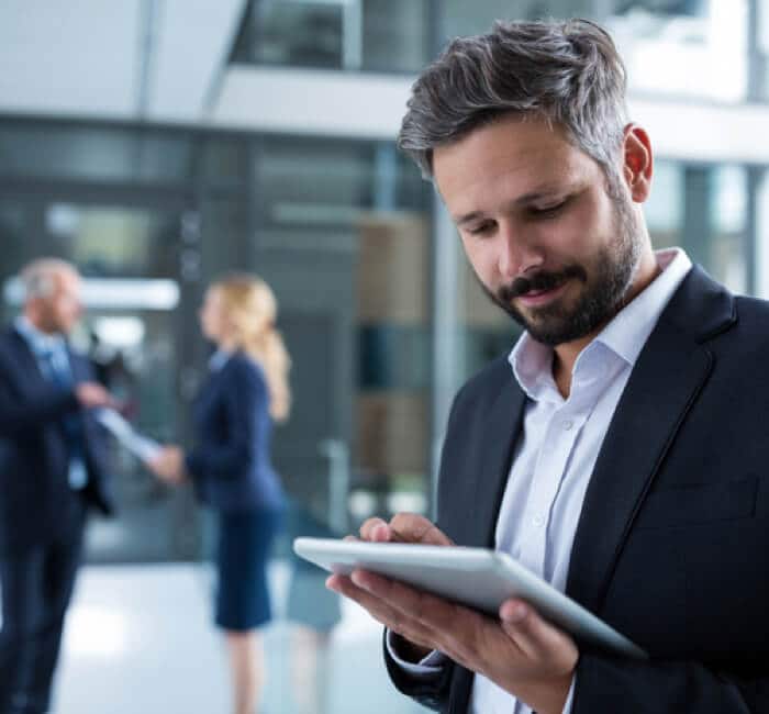 Man looking at iPad Man looking at iPad