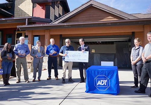 ADT recognized the Park City fire and building departments with checks for $5,000 each.