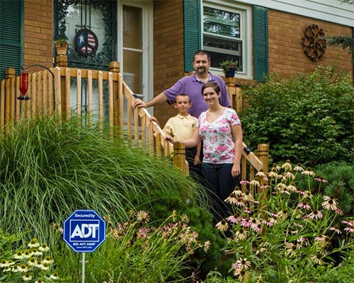 Chris, Ainsley and Duncan Collins in front of their Hendsersonville, TN home. 