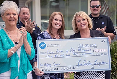 Lynn Langston awards $10,000 to the Texas Association of First Responders.