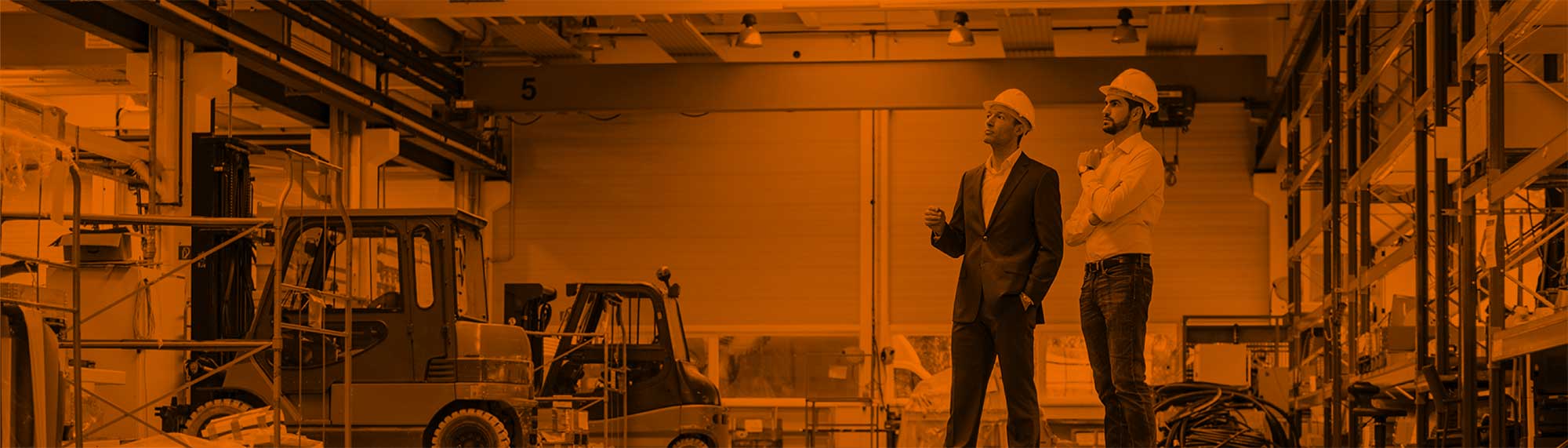 Businessmen in a warehouse