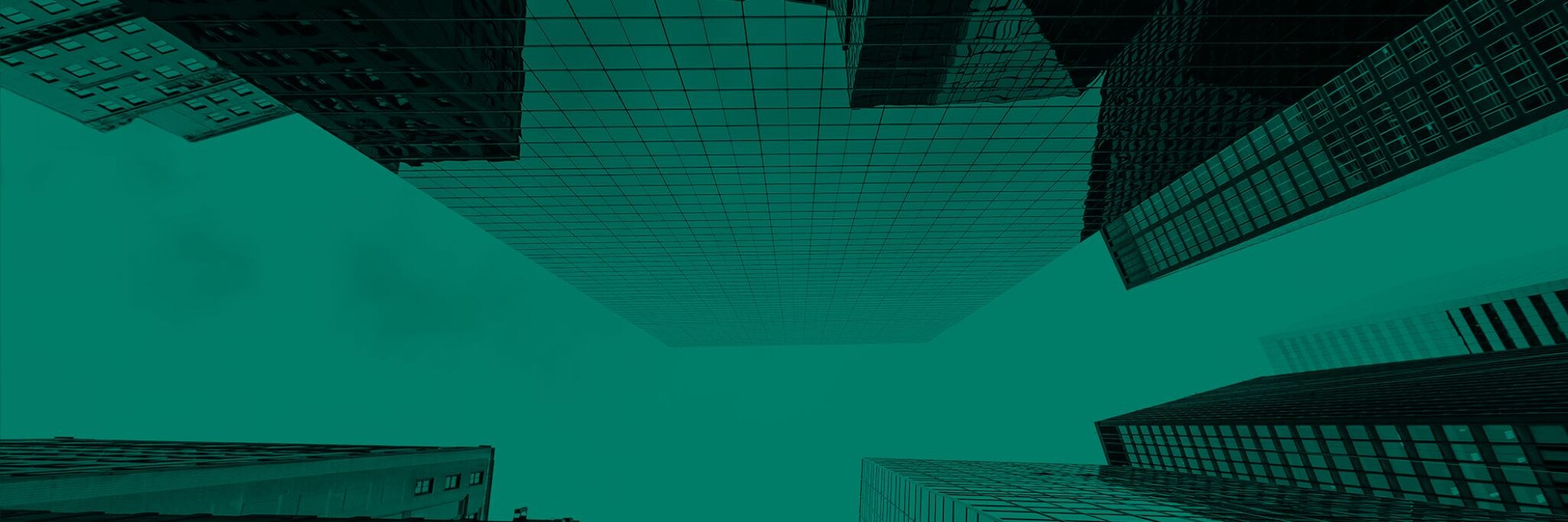 View of office skyscrapers from street level looking up