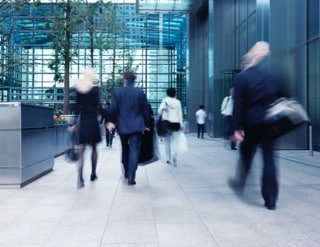 Office workers entering a building