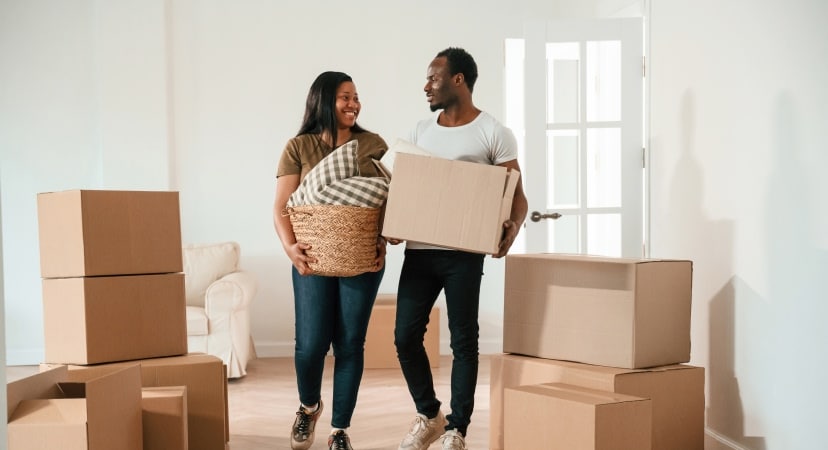 Family with moving boxes