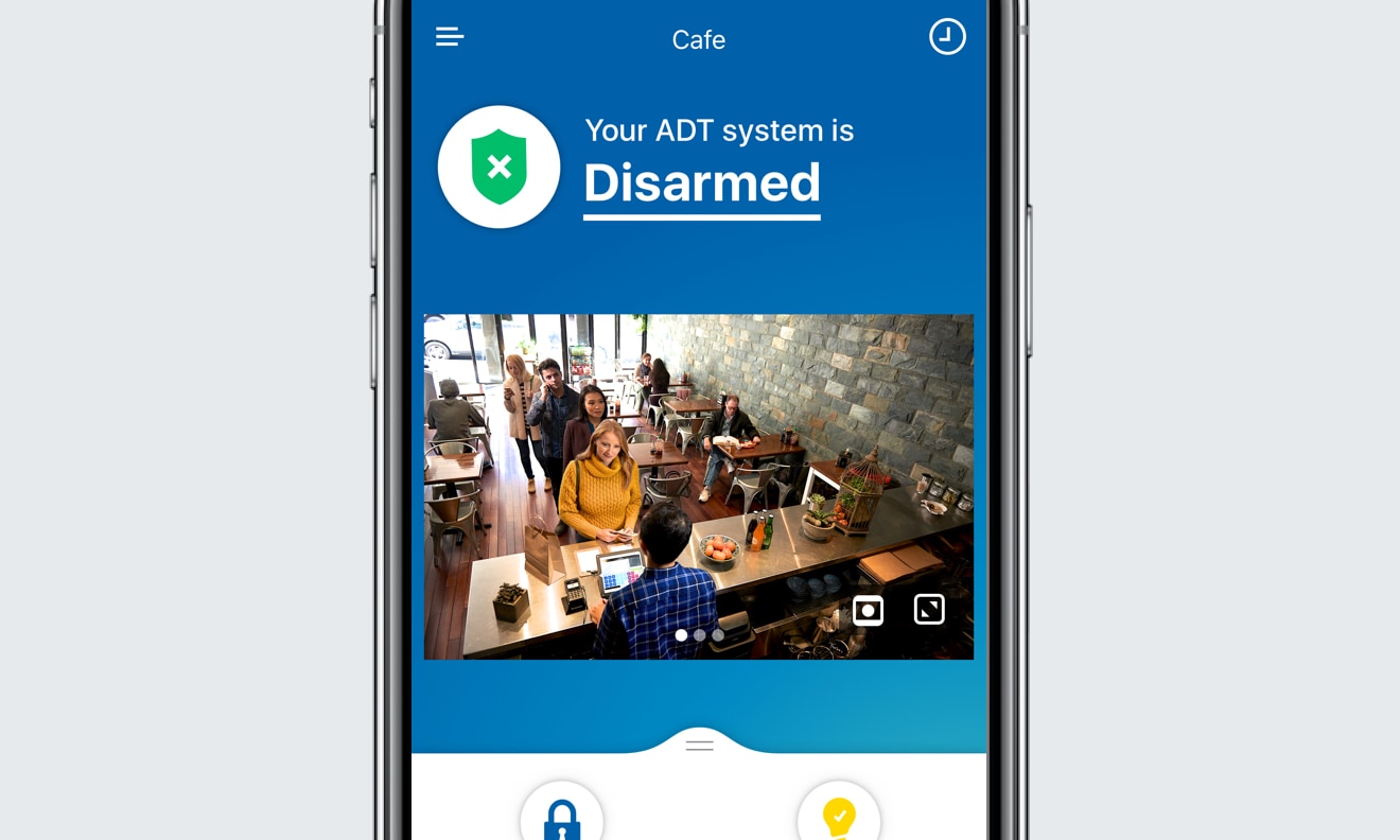 ADT app on phone showing security footage ADT app on phone showing security footage