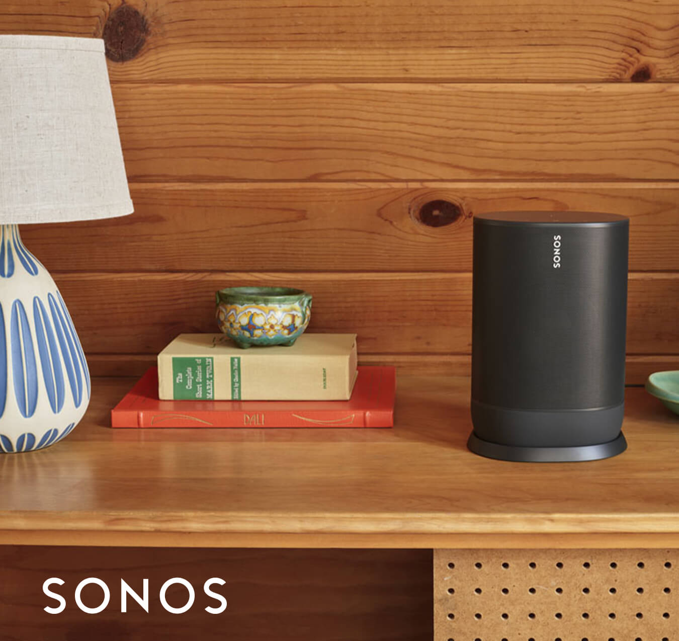 Sonos smart speaker on top of a dresser