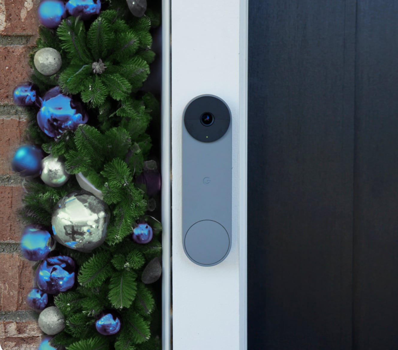Google Nest Doorbell on a house with holiday decorations Google Nest Doorbell on a house with holiday decorations