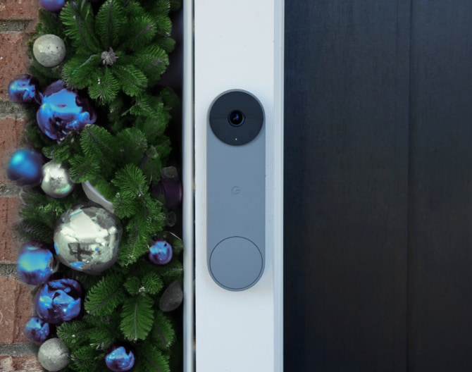 Google Nest Doorbell on a house with holiday decorations Google Nest Doorbell on a house with holiday decorations