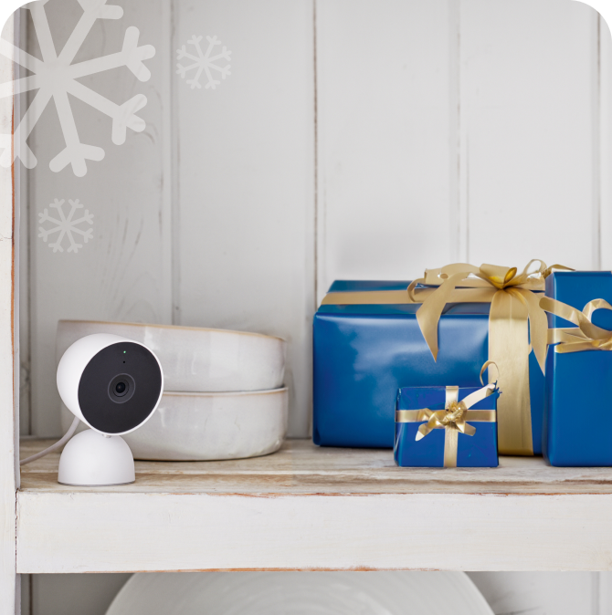 Google Nest Cam next to gifts