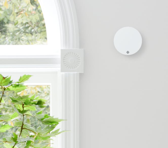 ADT Glass Break Sensor next to a window ADT Glass Break Sensor next to a window