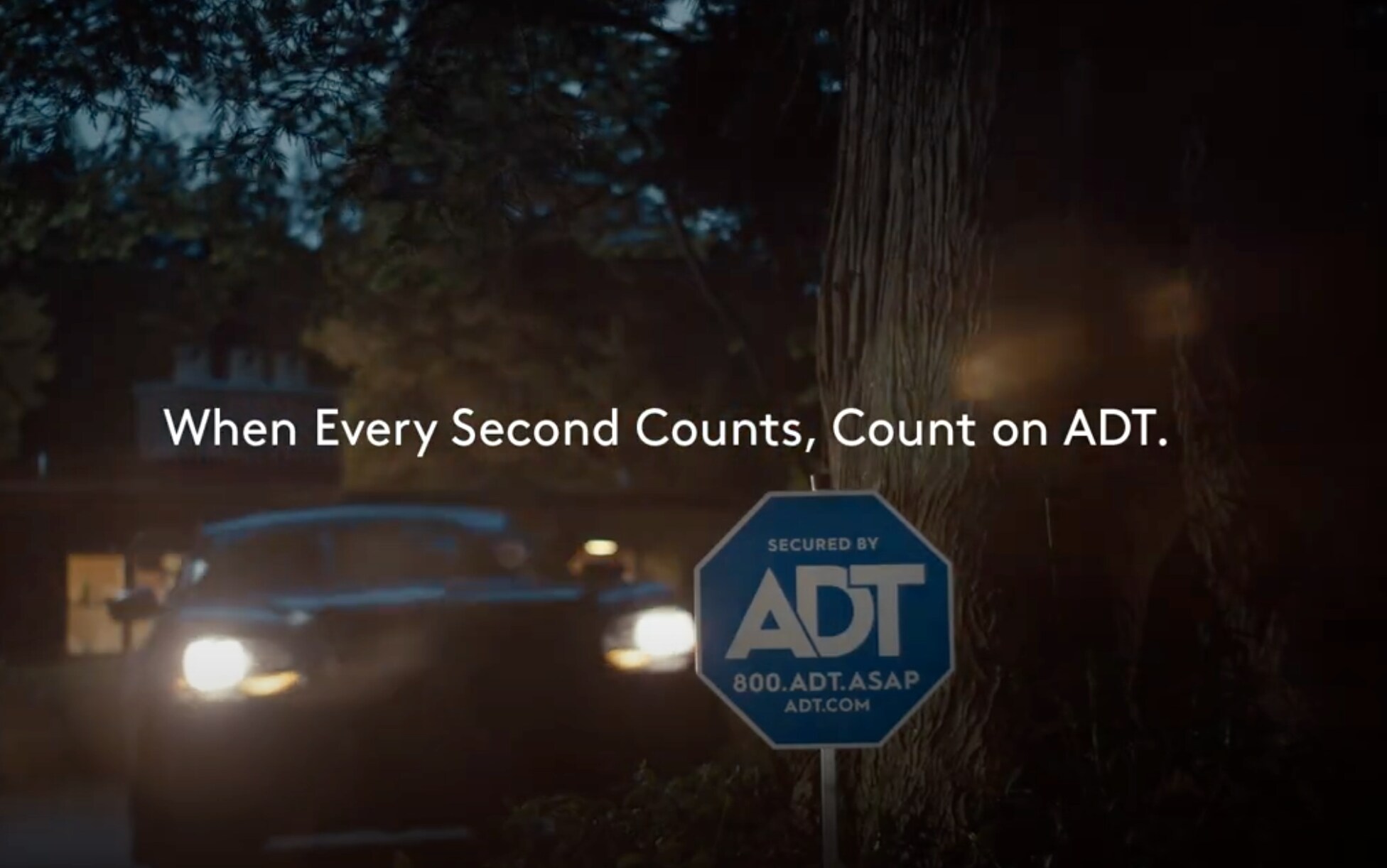Grey Nest Doorbell on a door
