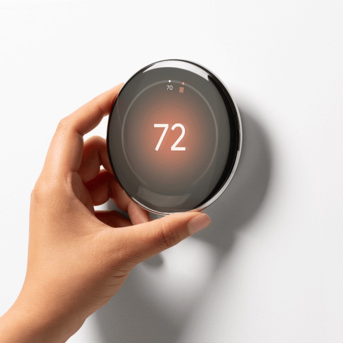 Google Nest Learning Thermostat on a wall 