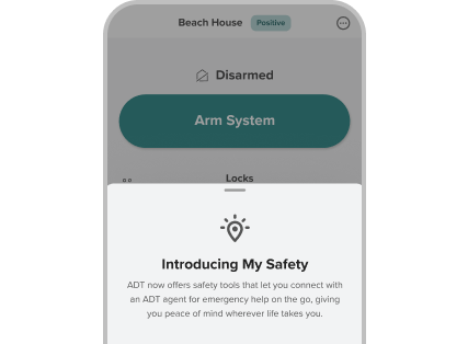 ADT+ app preview of My Safety with My Safety features. On screen text reads: Feel safe, wherever life takes you. 24/7 Emergency Help. Notify Emergency Services.