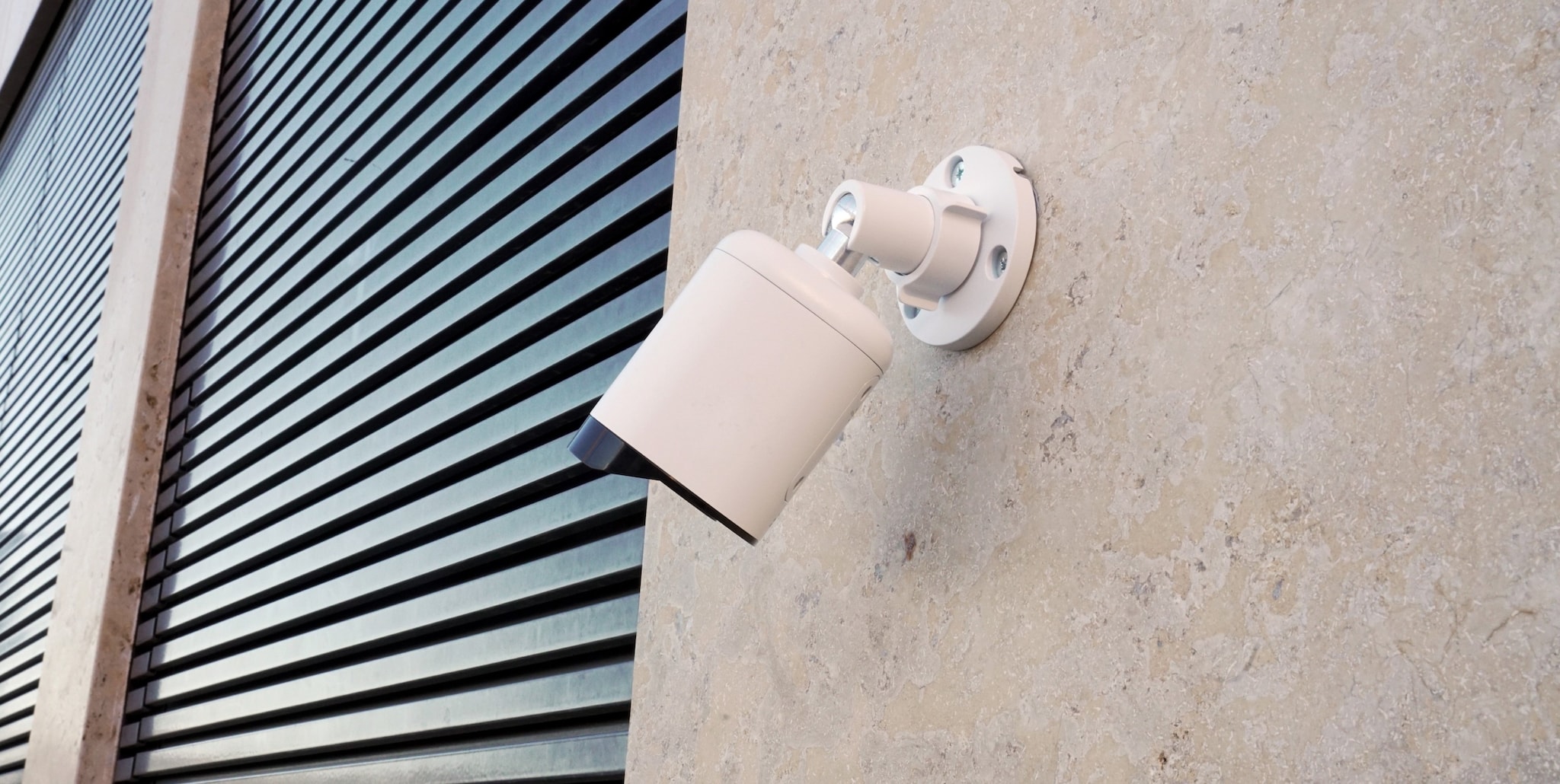 Camera mounted on an outdoor wall
