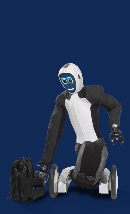 ADT EvoGuard bending to pick up a backpack