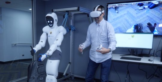 1X Technologies robot demonstration with human operator