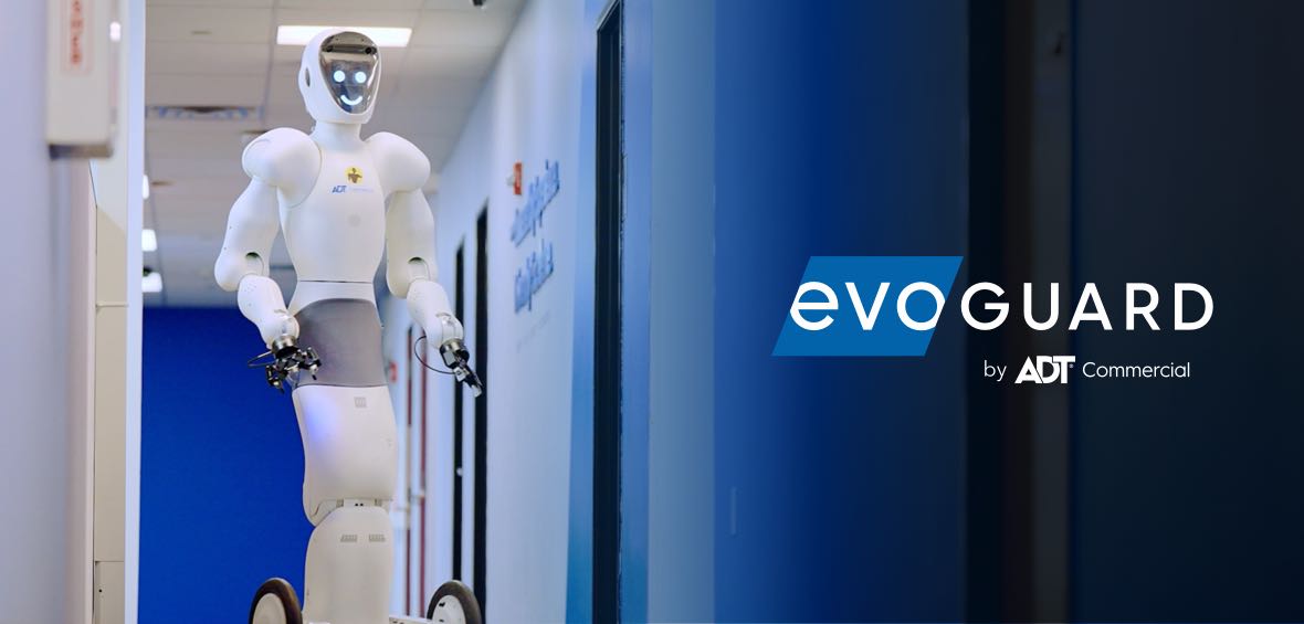 EvoGuard autonomous robot in hallway with EvoGuard by ADT Commercial logo superimposed