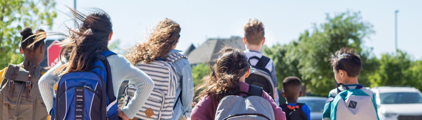 Students crossing parking lot