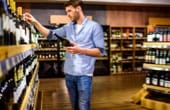 Shopper browsing wine in store