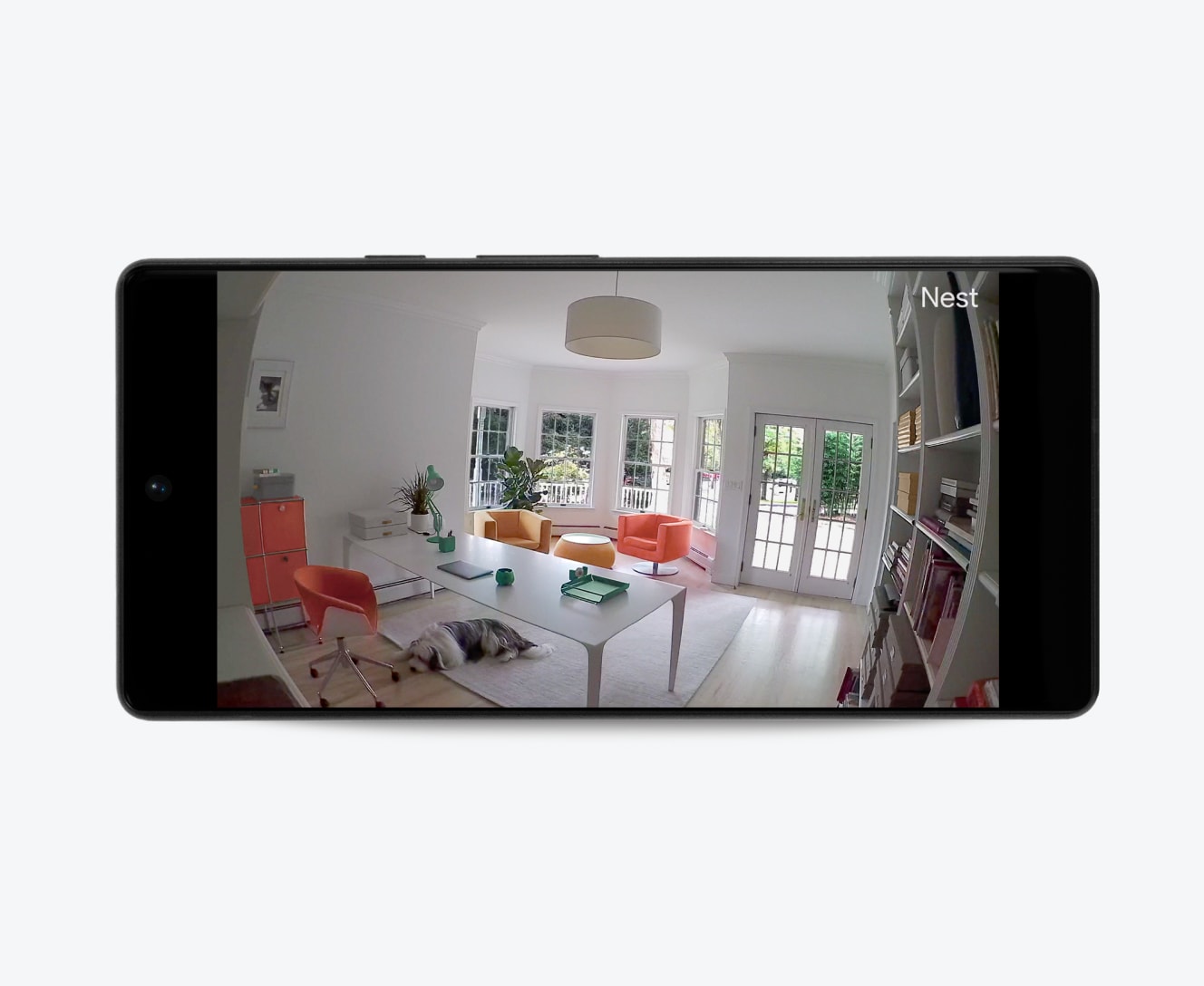 Google indoor camera next to a cellphone with live surveillance footage 