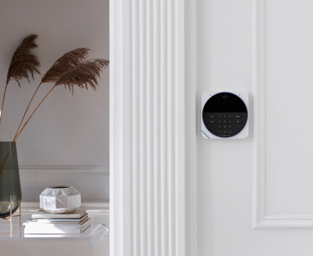 ADT keypad mounted in a home ADT keypad mounted in a home