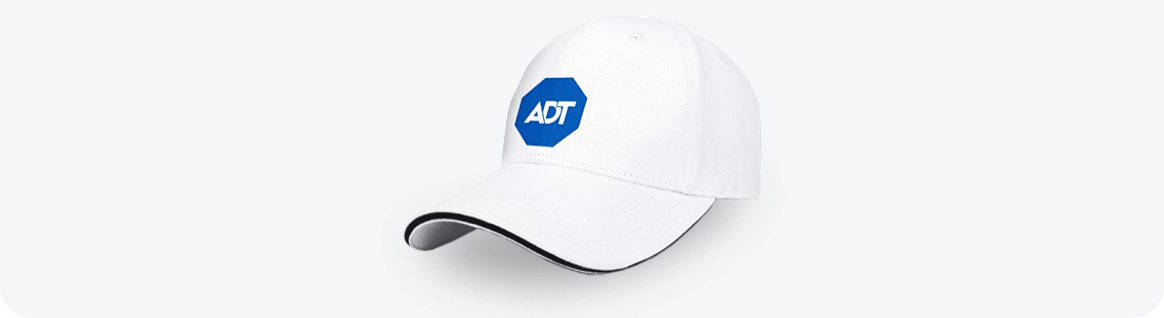 White hat with a blue ADT logo on it
