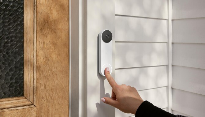 Hand ringing the Google Nest Doorbell