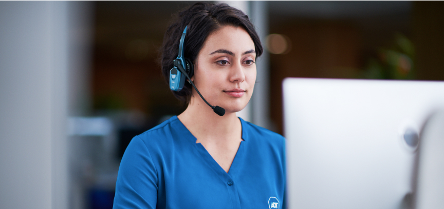 ADT employee on a headset 