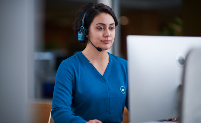 ADT employee on a headset 