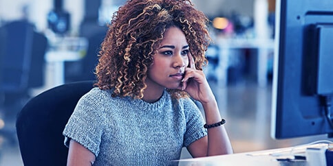 Woman using a computer Woman using a computer