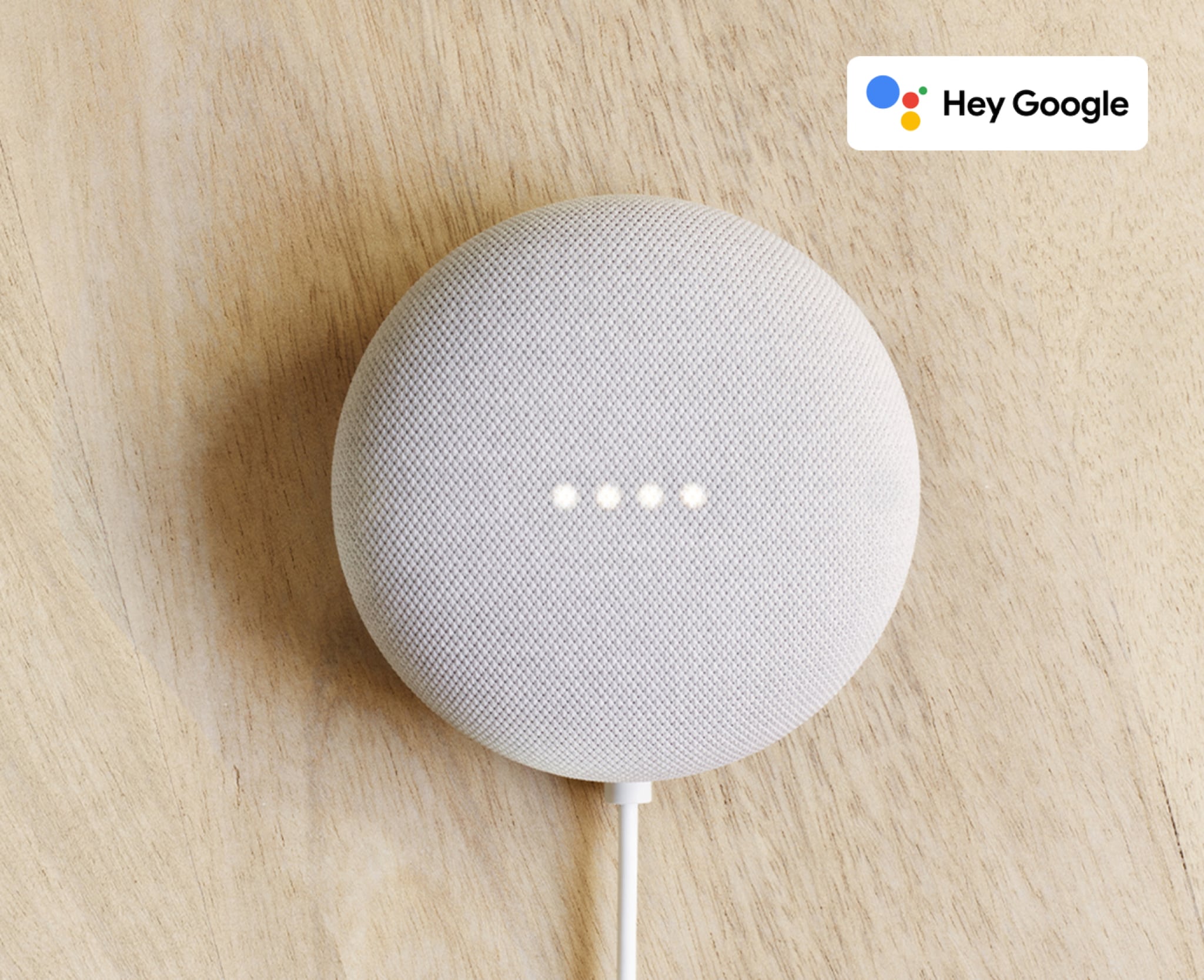 Google assistant on a wooden background