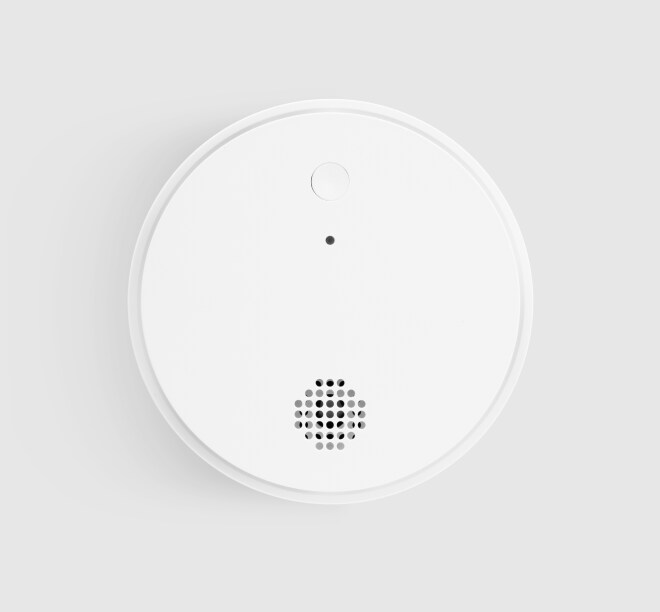 ADT Smoke Detector on a grey background