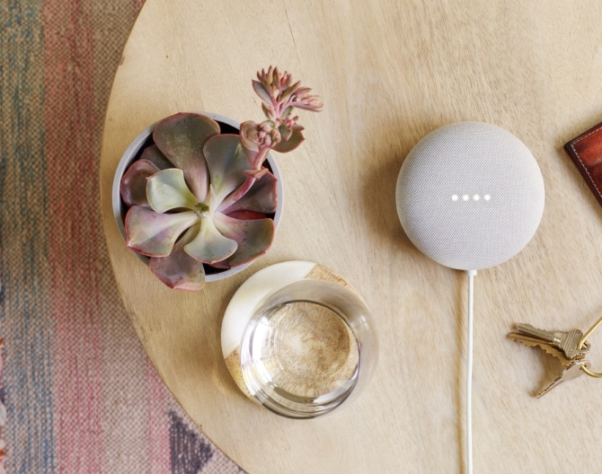 Google Nest Mini 2 Gen on a table Google Nest Mini 2 Gen on a table