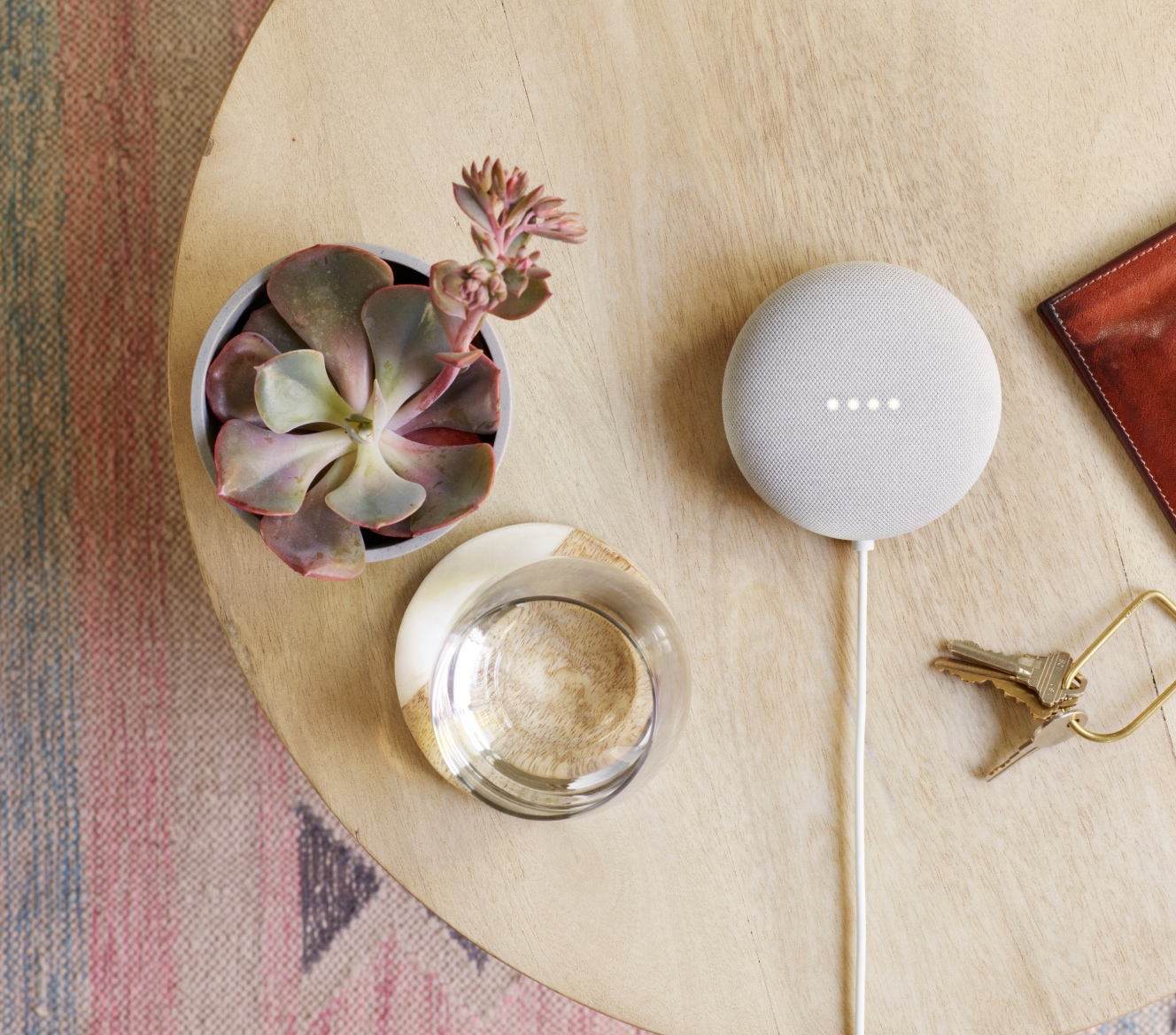 Google Nest Mini 2 Gen on a table Google Nest Mini 2 Gen on a table