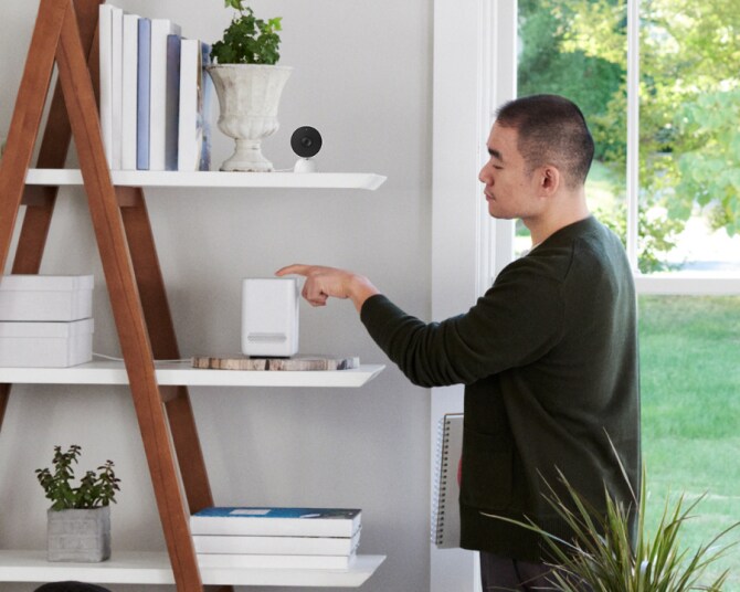 Man installing DIY Hub in his home Man installing DIY Hub in his home