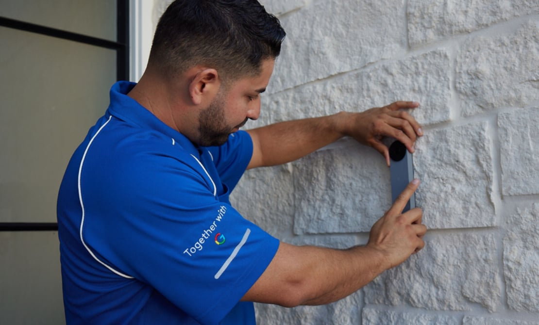 ADT employee installing Google Nest Doorbell